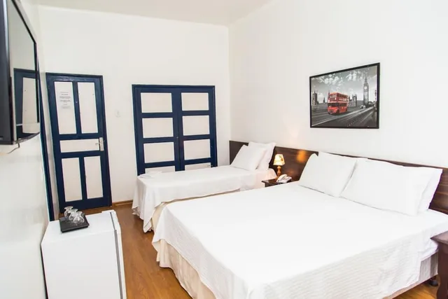 غرفة قياسية ثلاثية بسرير مزدوج وسرير فردي، Hotel Londres 1/5