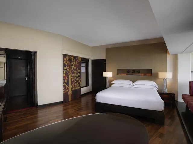 جناح جونيور بسرير مزدوج بإطلالة على الحديقة، Pullman Phuket Karon Beach Resort 4/9