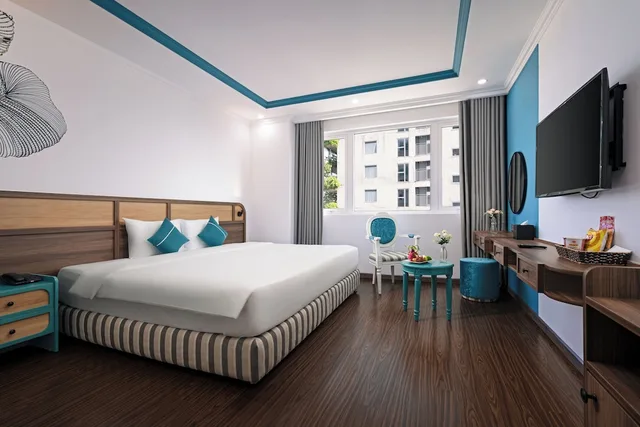 غرفة بريميوم بإطلالة جزئية على البحر، PARACEL DANANG HOTEL 1/5