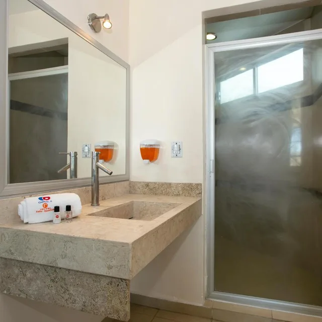 غرفة ديلوكس بسريرين، Capital O Hotel Euro Confort Pachuca 7/9