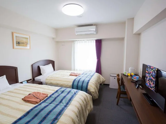 Room, Twin Beds, Side Sea View، Hotel Peace Island Nago 1/2