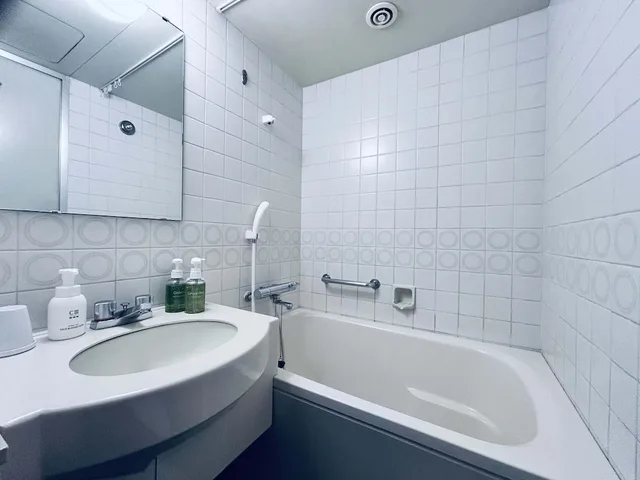 غرفة قياسية بسرير كوين، Grand Central Hotel 5/7