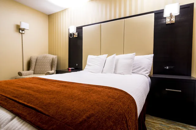 Room, Queen Bed, Sofa, Sinbads Hotel And Suites 1/4