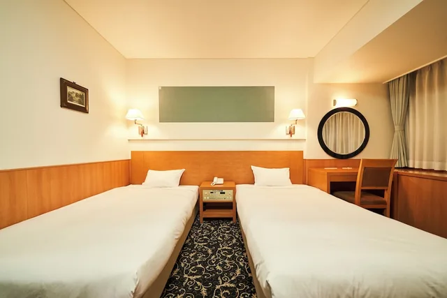 غرفة ثلاثية بسريرين منفصلين مع أريكة في الملحق، Hotel Global View Kushiro 3/6
