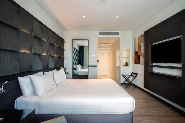 غرفة قياسية بسرير كينج، Wish More Hotel 1/9