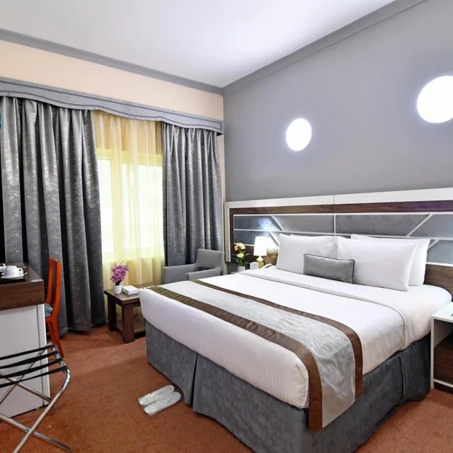 غرفة ديلوكس تنفيذية بسرير كينج، NEJOUM AL EMARATE HOTEL 2/10
