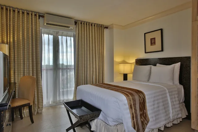 جناح بسرير مزدوج وسرير فردي بغرفة نوم واحدة، Crown Regency Suites Mactan 1/10