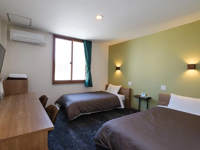 غرفة اقتصادية بسريرين منفصلين مع أريكة، Matsuyama New Grand Hotel 1/3