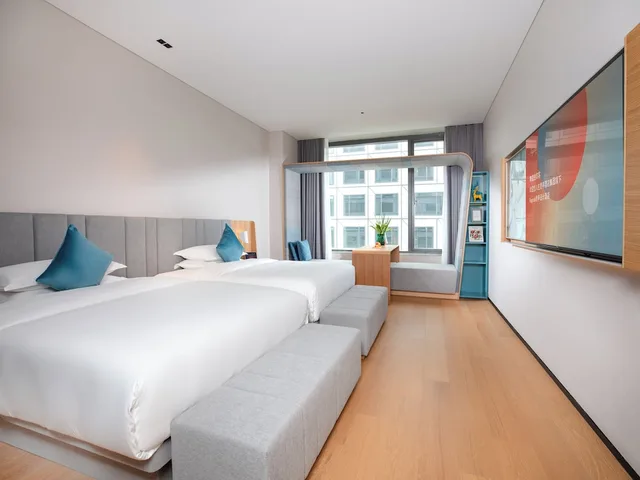 غرفة ديلوكس بسريرين كوين، Pagoda Hotel Hangzhou Zijingang 1/2