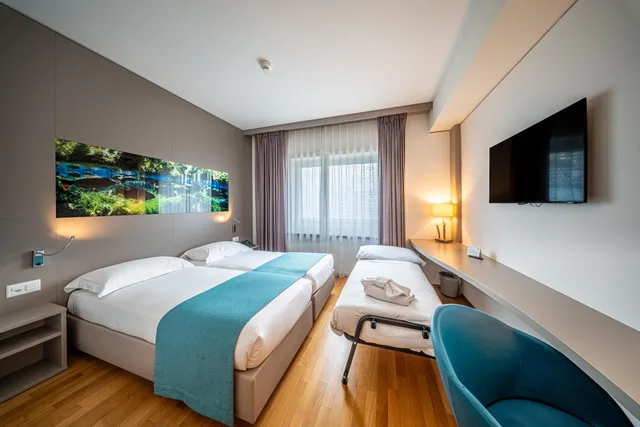 غرفة سوبيريور بسرير كوين وسرير فردي، Aquatis Hotel 2/2