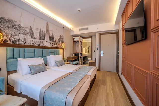غرفة قياسية بسرير مزدوج وسرير فردي، Grand Hilarium Hotel 10/10