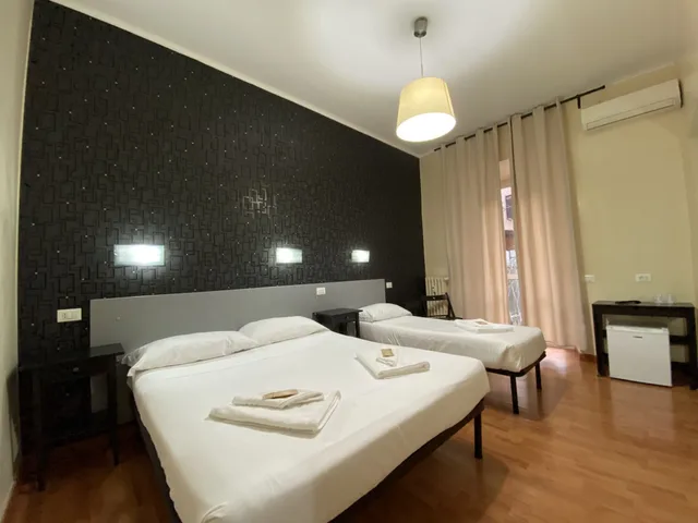 غرفة ديلوكس ثلاثية بسرير مزدوج وسرير فردي، The Place In Rome 5/10
