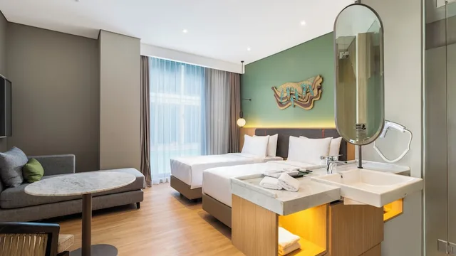 غرفة ديلوكس بسريرين منفصلين، Swiss-Belinn Indramayu 1/4