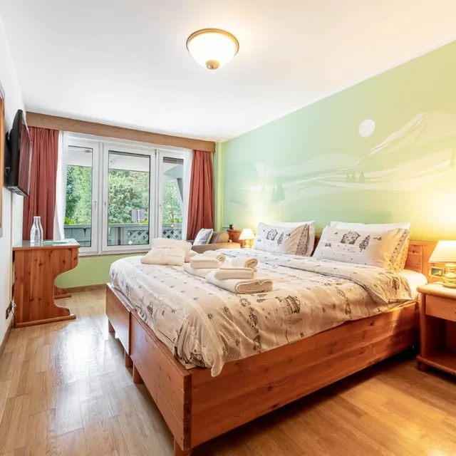 غرفة قياسية بسرير مزدوج أو سريرين منفصلين، Schloss Hotel & Club Dolomiti 1/8