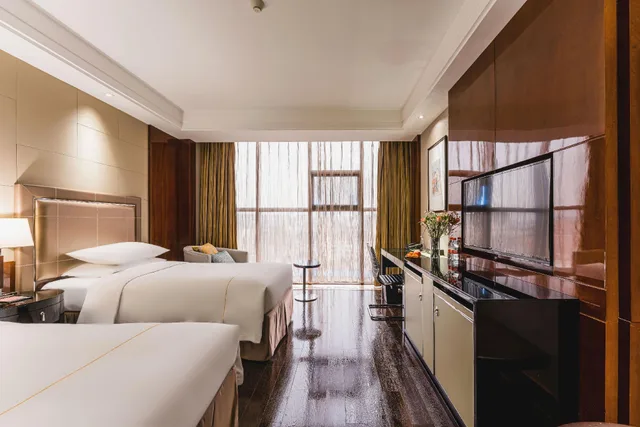 غرفة ديلوكس بسريرين منفصلين، Maixinge International Hotel 2/2