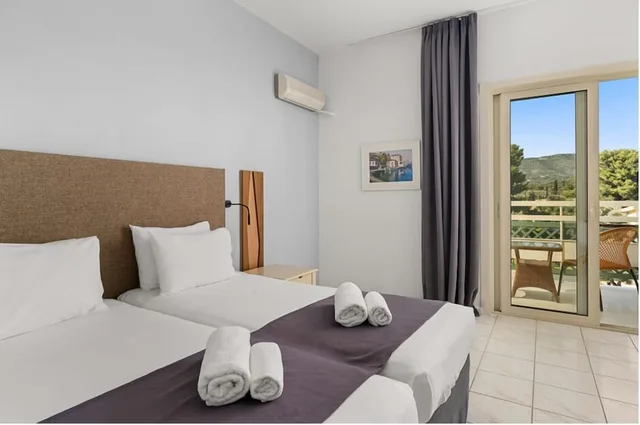 غرفة بسرير مزدوج أو سريرين منفصلين بإطلالة على الحديقة، Palmariva Beach Hotel By Anayia All Inclusive Resorts 1/8