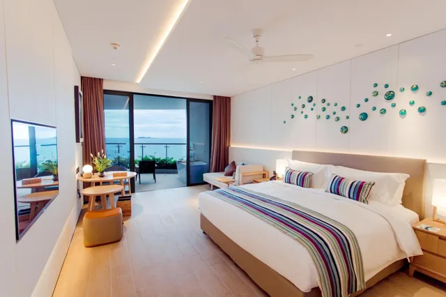 غرفة بسرير كينج وسرير كوين بإطلالة على البحر، Sanya Conifer Resort 1/2