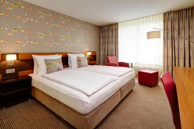 غرفة كومفورت بسريرين منفصلين بشرفة، Trans World Hotel Kranichhohe 1/3