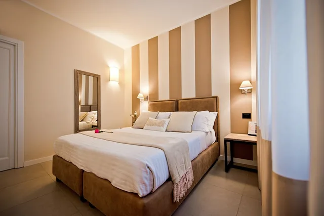 غرفة ديلوكس عائلية بسرير كينج بإطلالة على المدينة مع أريكة، Delle Vittorie Luxury Suites & Rooms 9/10