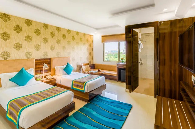 غرفة ديلوكس بسريرين منفصلين، Inde Hotel Cyber City 1/1