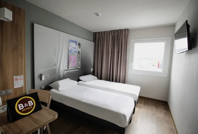 غرفة بسريرين منفصلين، B And B Hotel Montelimar Sud 1/4