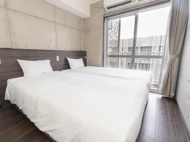 Room, Twin Beds, New Building، The Breakfast Hotel Porto Ishigaki 3/5