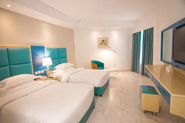 غرفة بريميوم بسرير كينج وسرير كوين، BM Beach Hotel 2/9