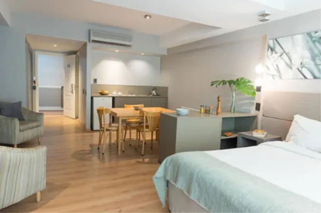 جناح بسرير كوين، Portal Plaza Suites 2/4