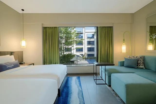 غرفة بسريرين منفصلين بإطلالة على المسبح مع أريكة، Hyatt Centric Candolim Goa 4/10