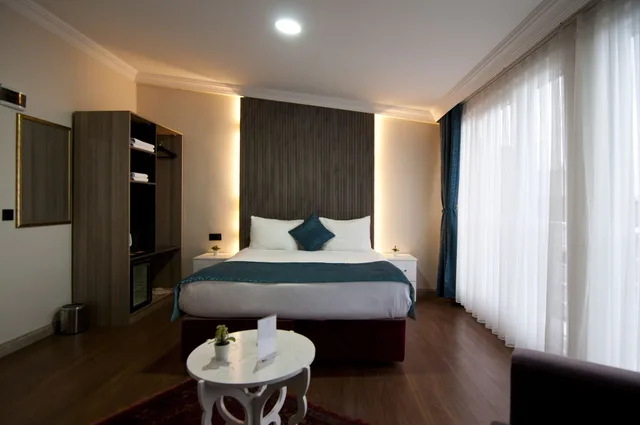 غرفة ديلوكس بسرير كوين وسرير فردي، Nar Sultan Hotel 9/10
