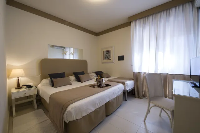 غرفة قياسية ثلاثية بسرير كوين وسرير فردي، PARK HOTEL MARACAIBO 1/3