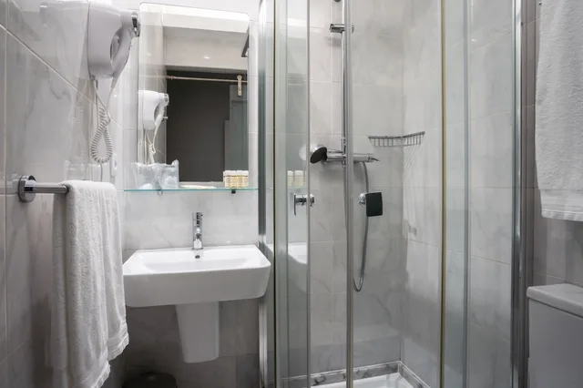 غرفة قياسية ثلاثية بسرير مزدوج مع أريكة، Pao de Acucar Hotel 3/3
