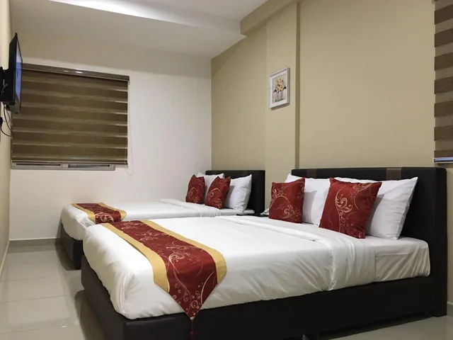 غرفة ديلوكس عائلية بسرير كوين وسرير فردي، Global Inn Hotel 1/1