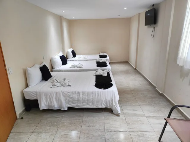 غرفة قياسية ثلاثية بسريرين مزدوجين، Hotel Ashly Loma Larga 3/5