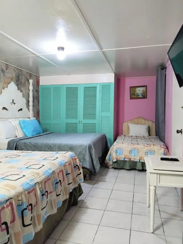 Family, 1 Single and 2 Queen Beds, Pool Access, Pinkhibiscus Guest House 1/10
