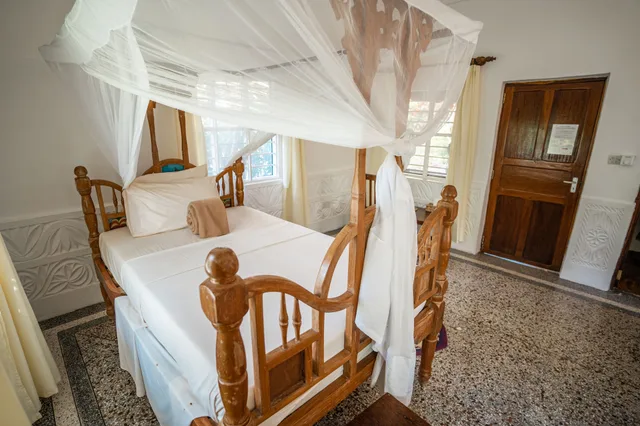 غرفة بسرير مزدوج بإطلالة على الحديقة، Pongwe Beach Hotel 2/5