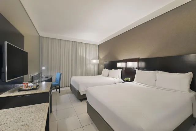 غرفة فاخرة بسريرين منفصلين، Hotel Deville Prime Cuiaba 1/3