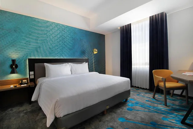 غرفة ديلوكس بسرير كينج وسرير كوين للمدخنين، Swiss-Belinn Airport Surabaya 4/10