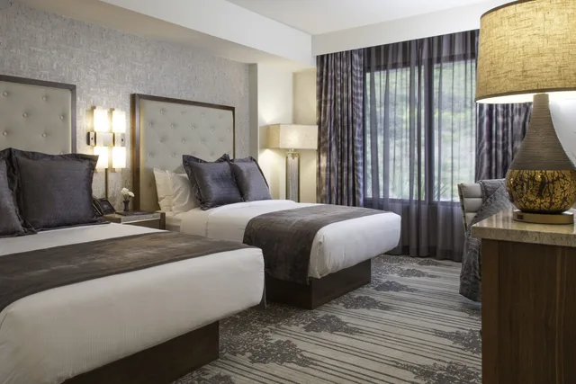Deluxe, 2 Queen Beds, Balcony, Accessible, Legacy Resort Hotel And Spa 1/2