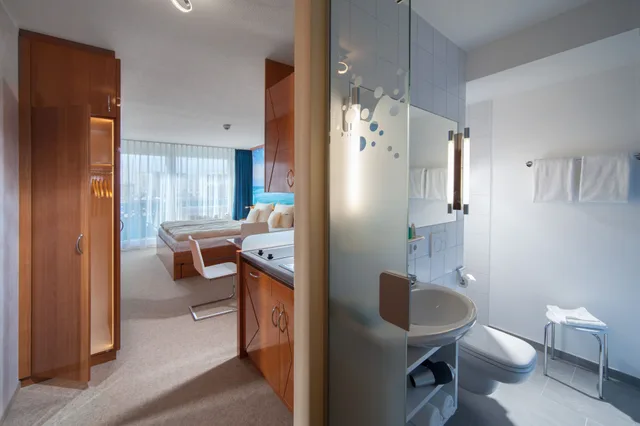 غرفة مفردة بسرير كوين، Victory Gastehaus Therme Erding 4/4