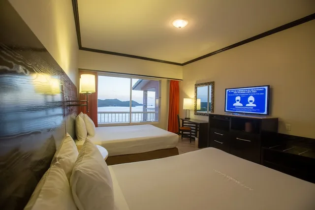 غرفة ديلوكس بسريرين مزدوجين بإطلالة على البحر، Azul Ixtapa Beach Resort Convention Center 2/5