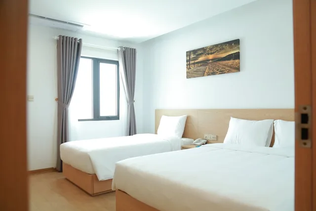 غرفة سوبيريور ثلاثية بسرير كوين وسرير فردي بإطلالة على المدينة، Gold Boutique Hotel Danang 1/4