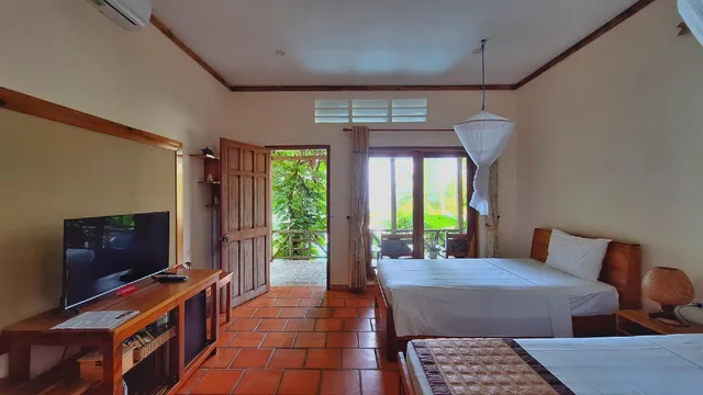 بنغل ثلاثي بسرير كوين وسرير فردي، Ancarine Beach Resort 1/1