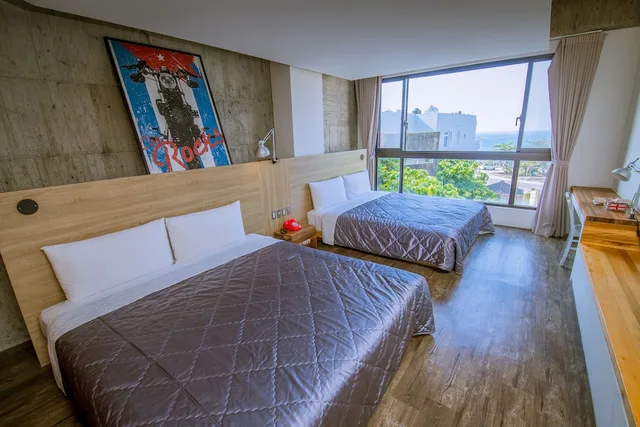 غرفة رباعية بسريرين كينج، El Puerto Hotel 1/10
