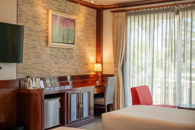جناح جونيور بسريرين منفصلين بشرفة، Erawan Hotel 7/10