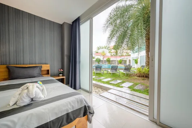 غرفة بسرير مزدوج بإطلالة على المسبح، Cozy Resort, A Boutique Hotel 3/9