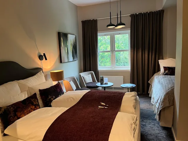 غرفة كلاسيكية ثلاثية بسرير كينج وسرير فردي، Molla Hotel 1/7