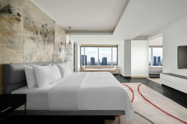 جناح رئاسي بسرير كينج بإطلالة على النهر مع دخول صالة النادي، Le Meridien Saigon 1/3