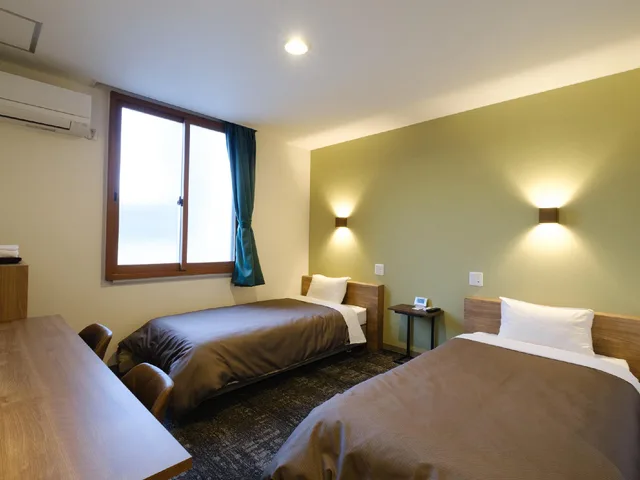 غرفة اقتصادية بسريرين منفصلين مع أريكة، Matsuyama New Grand Hotel 2/3
