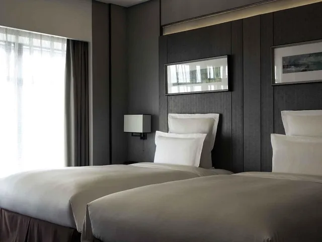 غرفة ديلوكس تنفيذية بسريرين منفصلين مع دخول صالة النادي في طابق مرتفع، Pullman Shanghai Xuhui (ex Pullman Shanghai South) 2/3